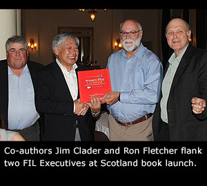 Jim Calder and Ron Fletcher with FIL Executives.